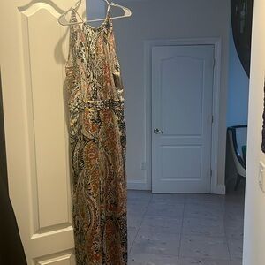 Beautiful wide leg mult color jumpsuit. Size 8 new with tags